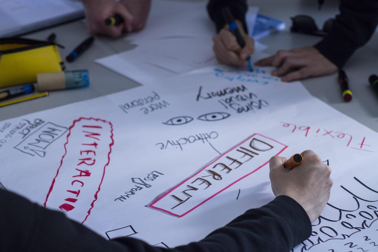 A sketching session for the Harbour Line project. The final logo is somewhere on this table.